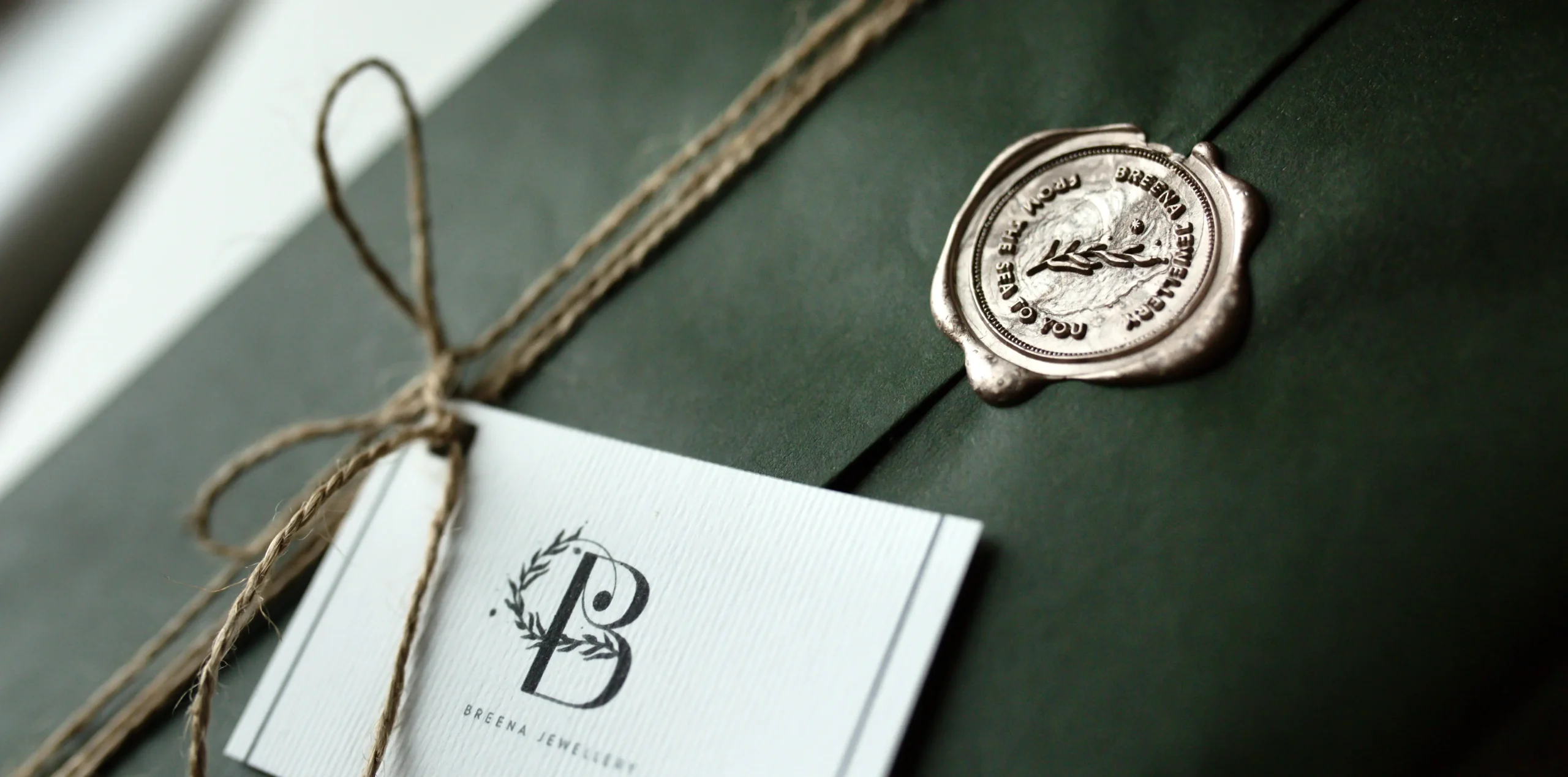 A photo showcasing the packaging of a meaningful Sea Glass Jewellery gift box, perfect for gifting to any ocean lover person.